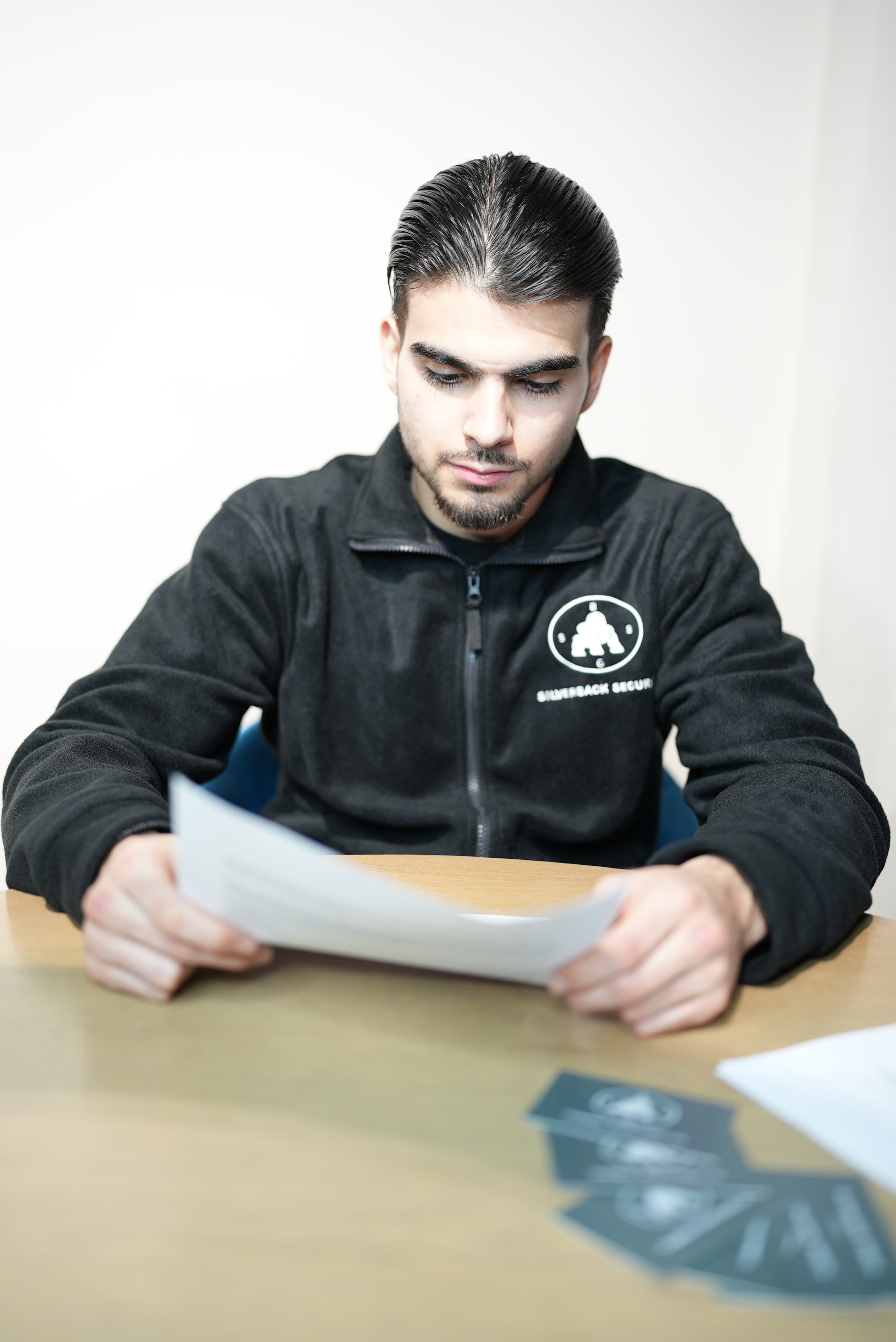 Silverback Security officer reviewing documentation