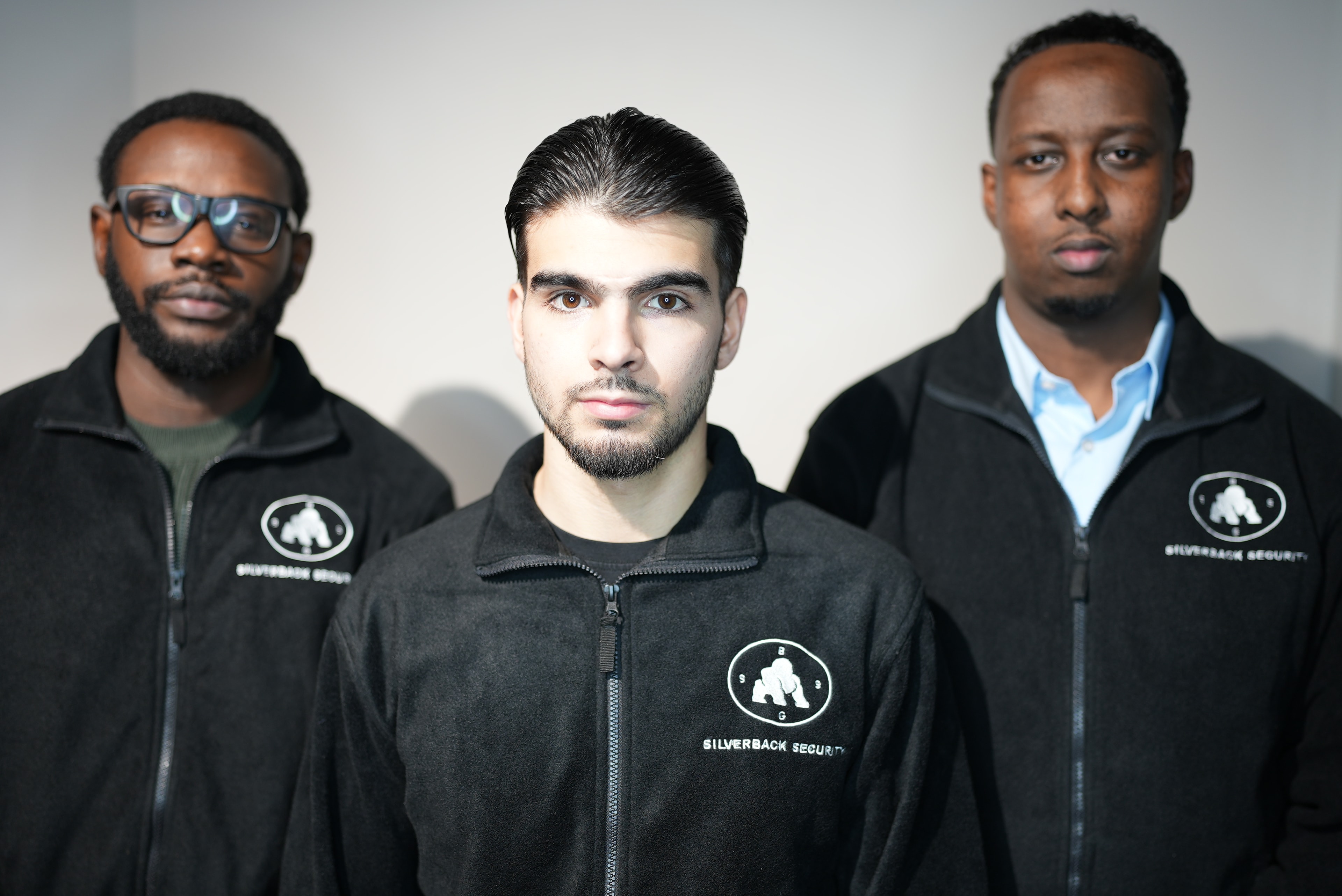Three Silverback Security officers in uniform